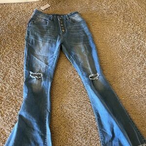 Gorgeous Flare Jeans With Amazing button details.